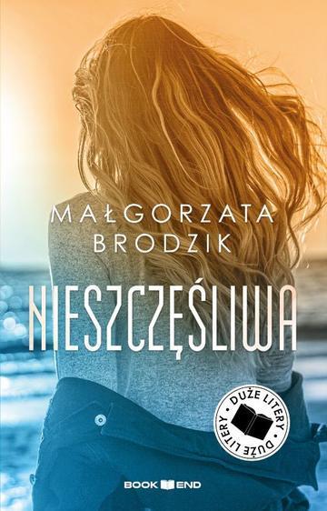 Nieszczęśliwa. Duże Litery